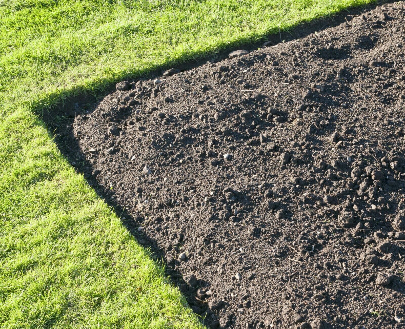 Freshly tilled topsoil in Collingwood ready for gardening.